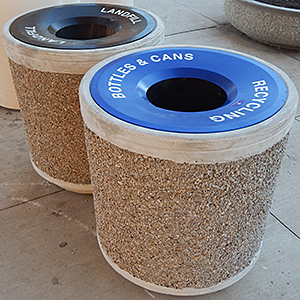 Cylindrical concrete bins for outdoor waste collection