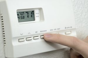 lowering the thermostat setting